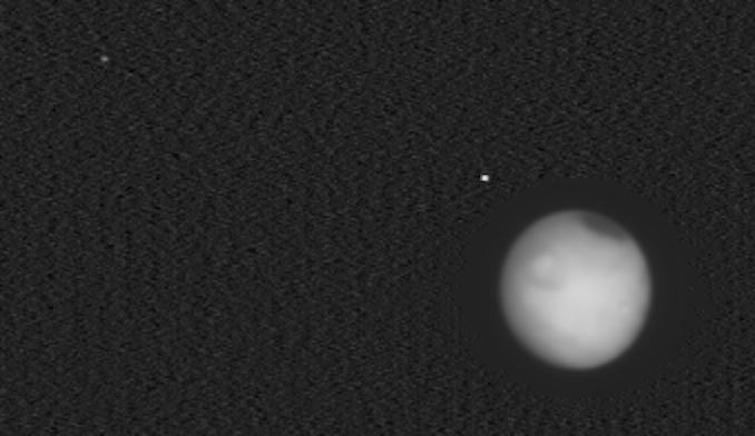 NASA spacecraft snaps a rare photo of Mars and its moons together