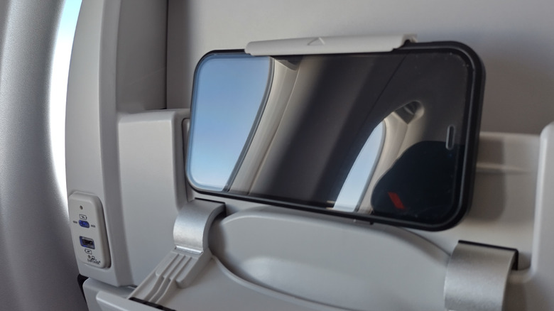 Is It Safe To Plug Your Phone Charger Into A Power Outlet On A Plane?